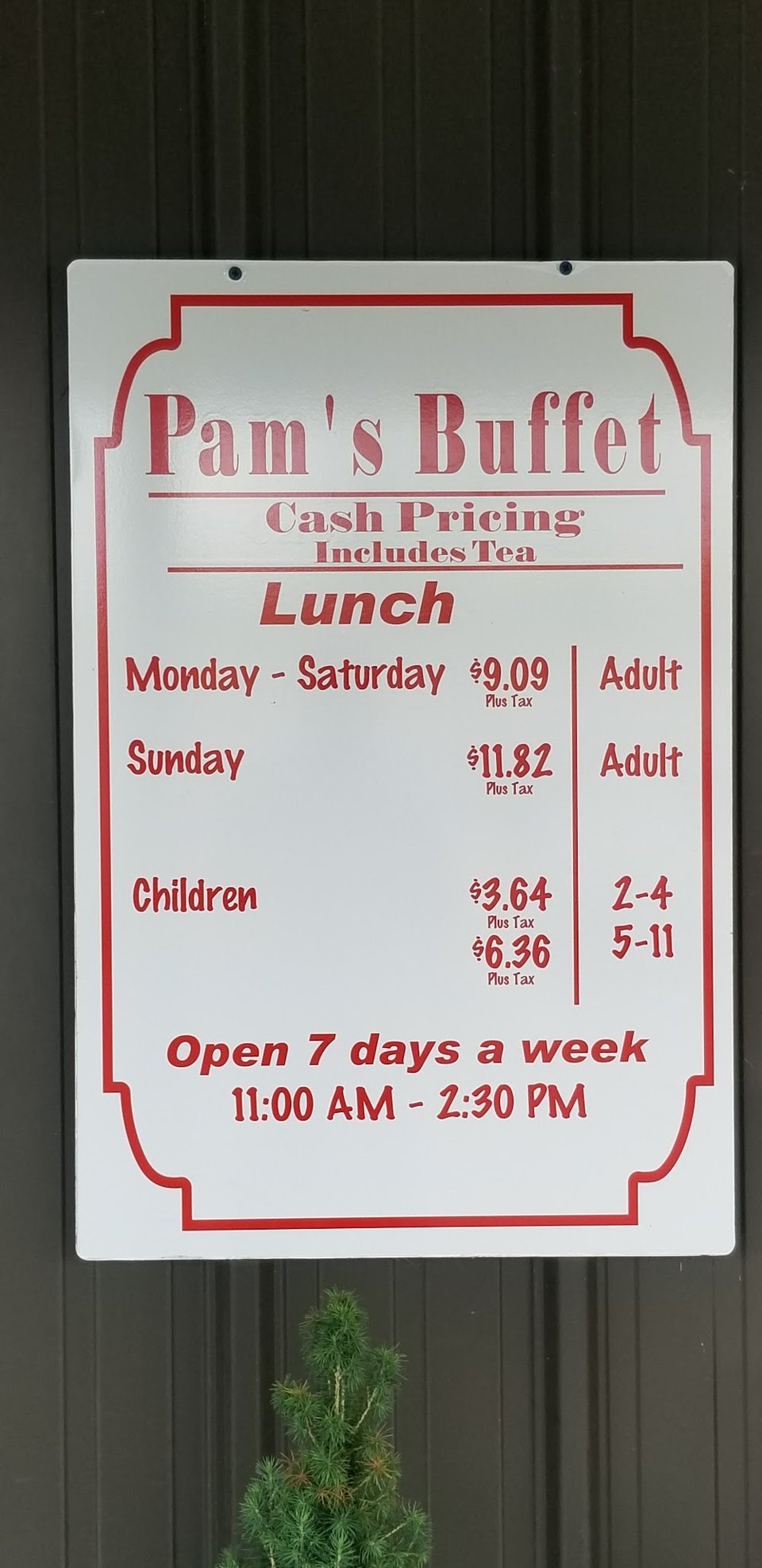 Menu board listing takeout plates and specialties.